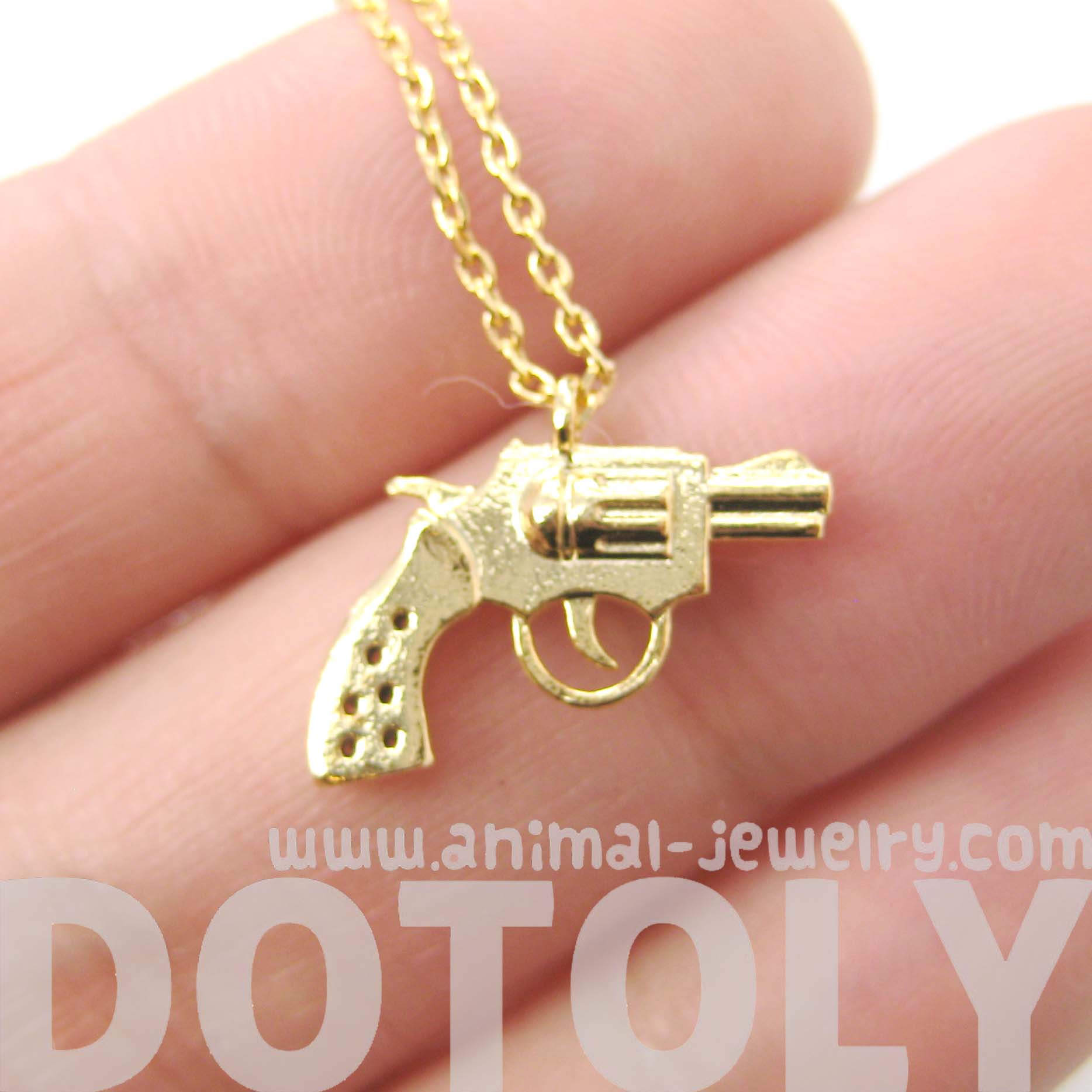 Revolver Gun Pistol Shaped Small Charm Necklace in Gold · DOTOLY Animal Jewelry · The Animal