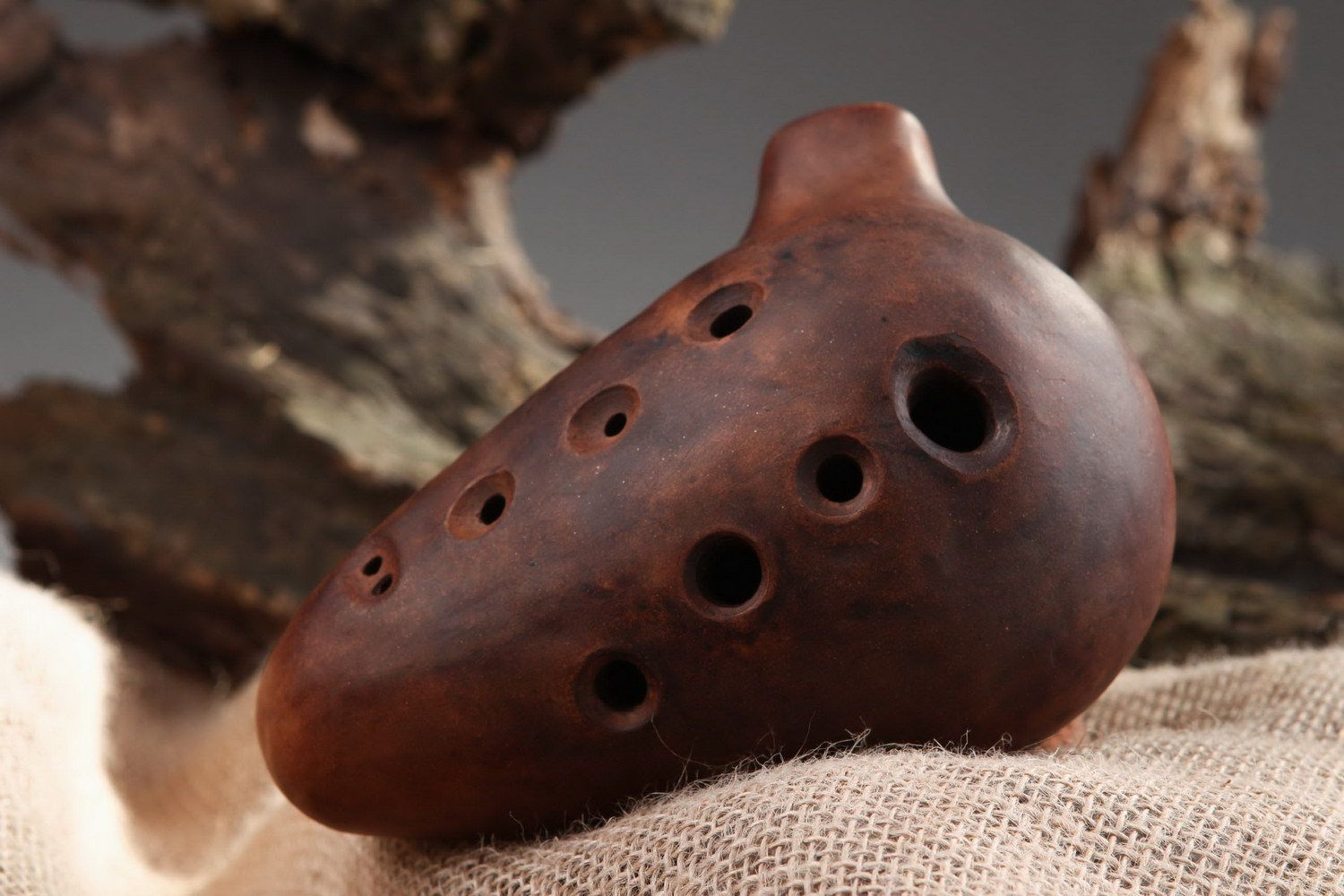 Ceramic handmade ethnic musical instrument brown ocarina globular flute
