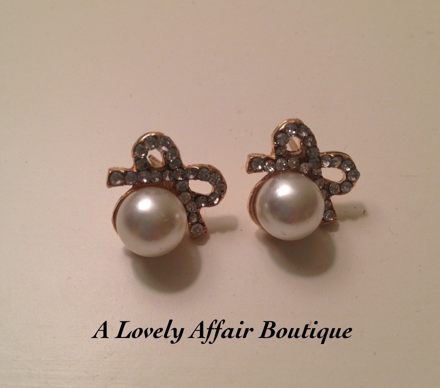A Lovely Affair Pearl Bow Earring Studs! Online Store Powered by