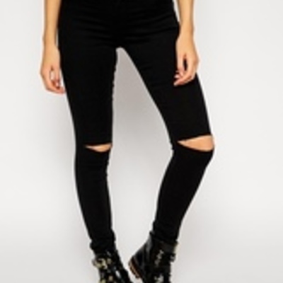 black jeans knee holes