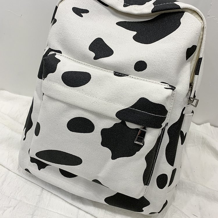 cow print backpack